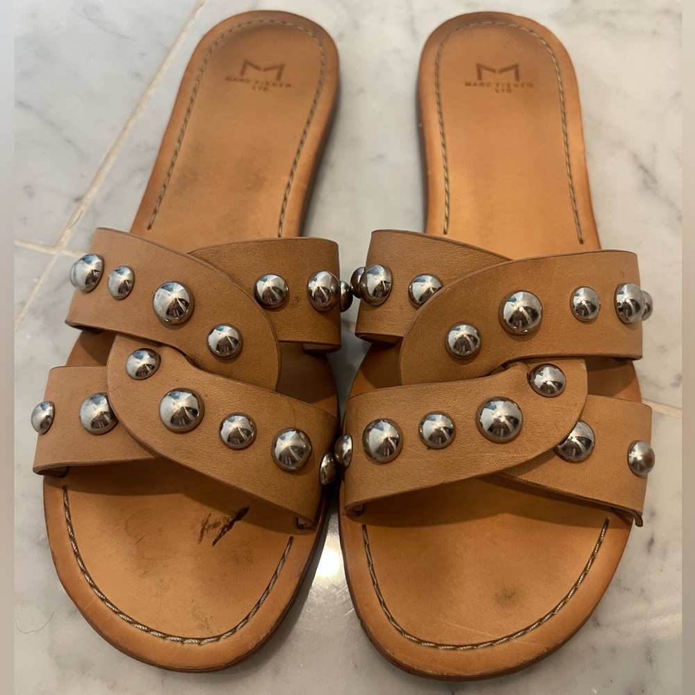 Marc Fisher slides with silver details.